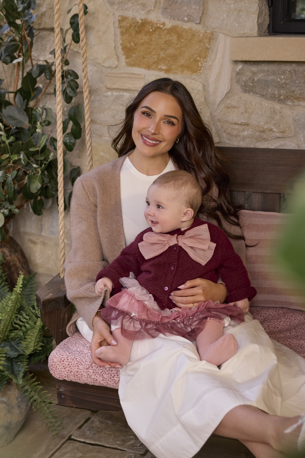 A child in a Picolette by Olivia Culpo look
